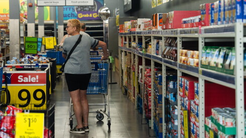Gladys Roman shops at Save A Lot in West Lawn, on Saturday. Items were on sale as the grocery store is set to close Saturday.
