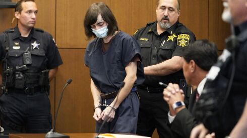 Robert E. Crimo III, walks in to the courtroom during a hearing in Lake County court Wednesday, Aug. 3, 2022, in Waukegan, Ill. Crimo III, accused of killing seven people and wounding dozens more in a shooting at an Independence Day parade in suburban Chicago pleaded not guilty on Wednesday, a week after prosecutors announced he faces 117 felony counts in the attack.