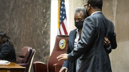 Mayor Lori Lightfoot speaks with Ald. Michael Scott during a Chicago City Council meeting on Oct. 14, 2021.