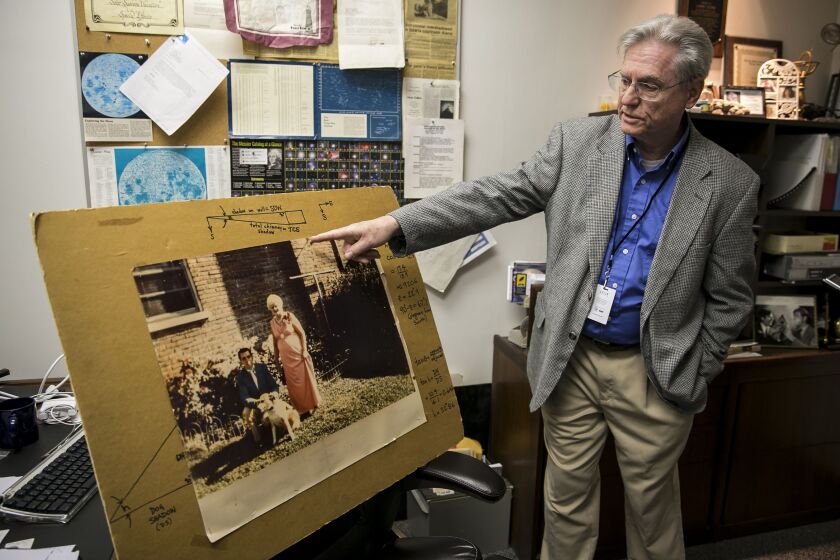 Larry Ciupik with the photo he testified about in court — an exercise he called “forensic astronomy.” | Ashlee Rezin/Sun-Times