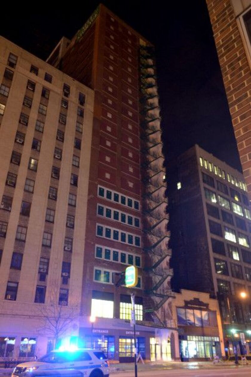 A building is covered by large amounts of ice due to a water leak at 615 S. Wabash. Wabash was closed Saturday night between Balbo and Harrison to pedestrian and vehicular traffic. | Justin Jackson/ Sun-Times