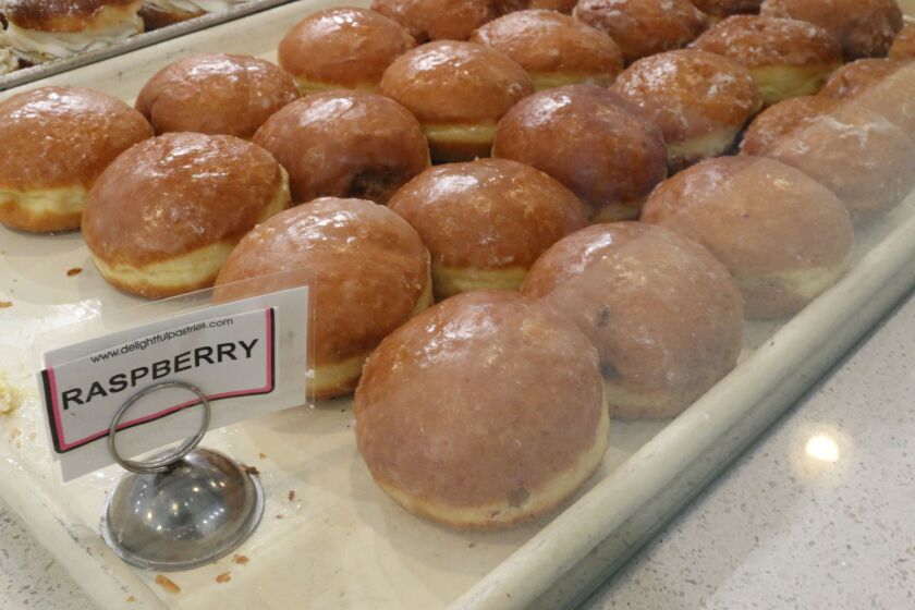 Raspberry-filled paczki await at Delightful Pastries Bakery in Jefferson Park. | Brian Rich/Sun-Times