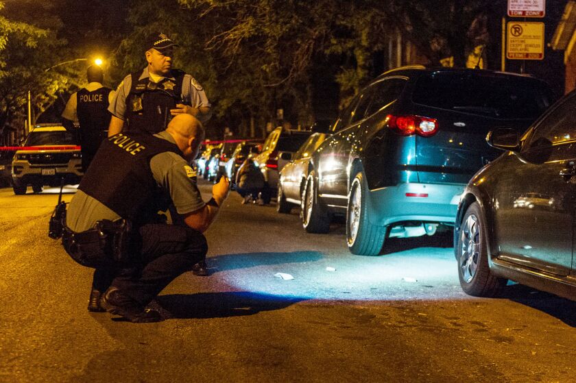 Police investigate a shooting Sunday night in the 1800 block of West Cullerton. Tyler LaRiviere/Sun-Times