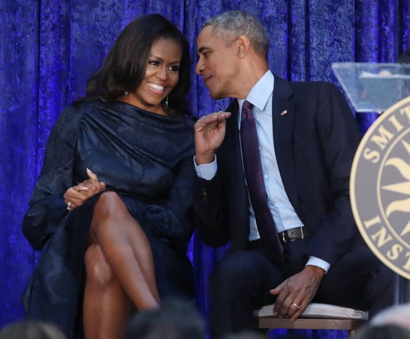 Former U.S. President Barack Obama and first lady Michelle Obama participate in the unveiling of their official portraits during a ceremony at the Smithsonian’s National Portrait Gallery, on February 12, 2018 in Washington, DC. | Mark Wilson/Getty Images
