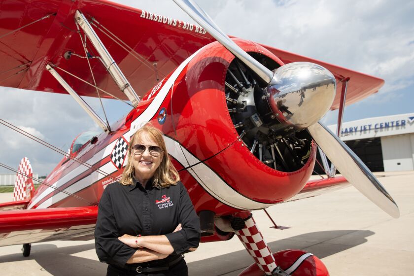 Pilot Susan Dacy stands in front of her Super Stearman, named “Big Red,” on Thursday at the Gary/Chicago International Airport in Gary as she prepares for the weekend’s 2023 Chicago Air and Water Show.