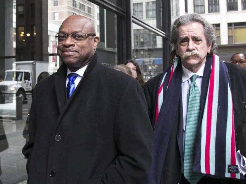Ald. Willie Cochran (20th) arrives for arraignment at the Dirksen Federal Courthouse in 2016. He was accompanied by attorney Thomas Durkin, right. File Photo. | Ashlee Rezin/Sun-Times