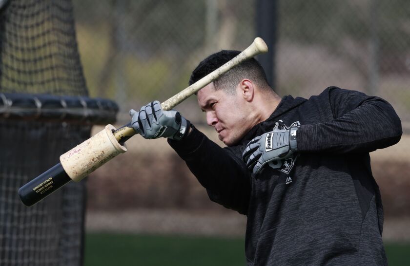 <em>Avisail Garcia warms up before hitting.</em>