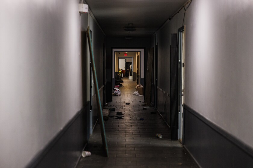 A hallway of a South Shore apartment building raided by federal agents during an anti-immigration campaign.