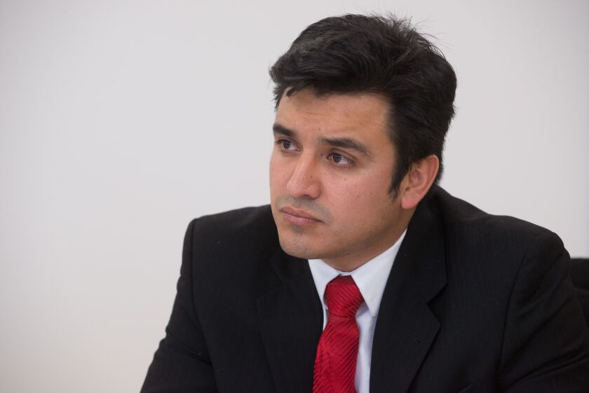 <strong><small>Byron Sigcho talks to the Sun-Times editorial board about running to represent the 25th Ward in Chicago City Council on Jan. 19, 2015. | Peter Holderness / Sun-Times</small></strong>
