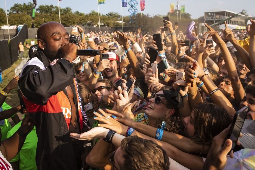 Freddie Gibbs performs on day three of Lollapalooza.