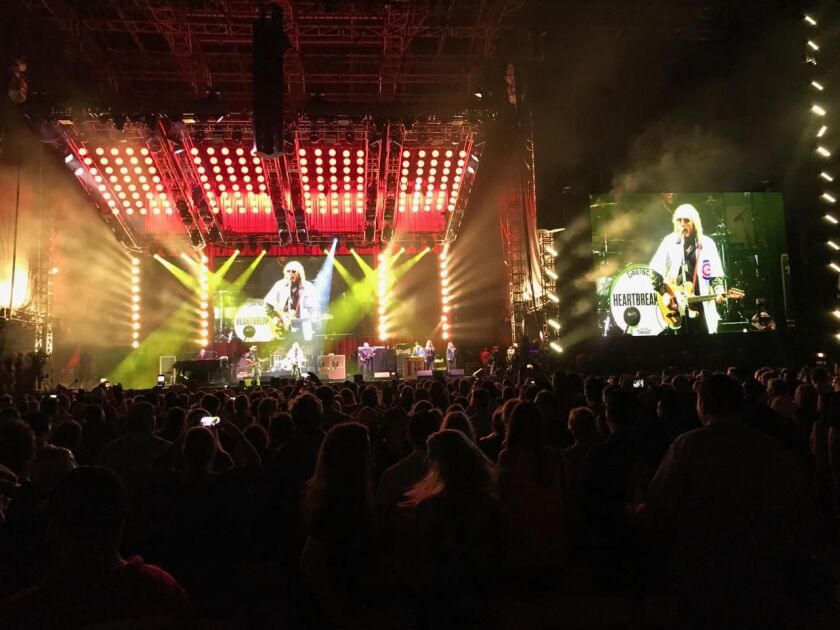 Tom Petty dons a Chicago Cubs jersey for his concert encore at Wrigley Field on June 29, 2017. | JEFF ELBEL PHOTO