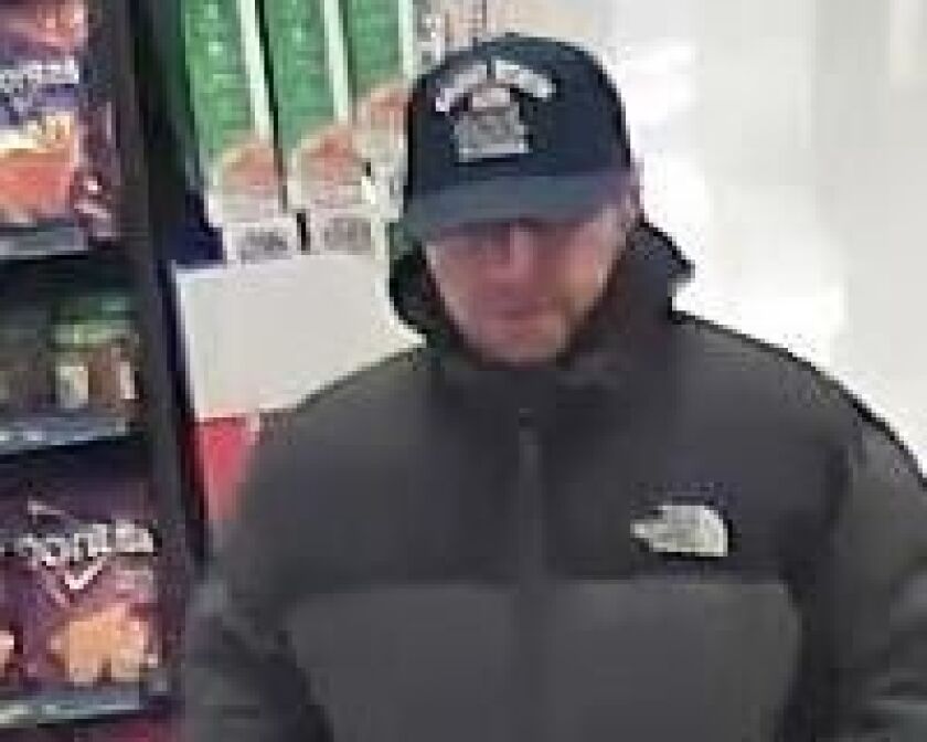 Surveillance image of the man suspected of robbing a TCF Bank branch Friday afternoon at 2520 N. Narragansett Ave. on the Northwest Side. | FBI