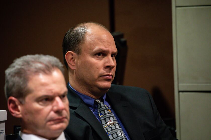 Chicago Police Officer Thomas Gaffney, right, next to his attorney William Fahy. | Zbigniew Bzdak/Chicago Tribune pool photo