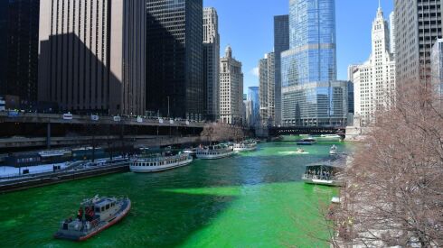 The Chicago River is dyed green Saturday for St. Patrick’s Day.