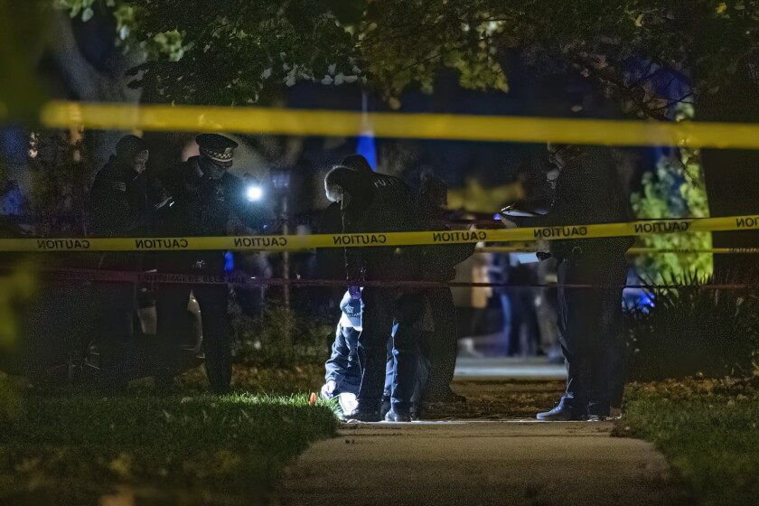 Chicago police investigate a homicide in the 5600 block of West Leland Avenue in Portage Park, Tuesday, Nov. 19, 2024. Court records show that prosecutors tried to have the suspect held in custody pending trial, but Judge Thomas E. Nowinski denied the request.