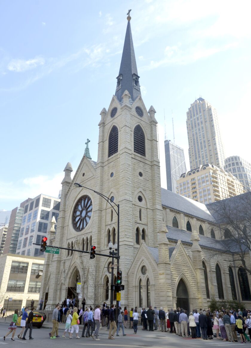 Some of the parking garage spots in a development proposed for a lot across the street from Holy Name Cathedral would be reserved for parishioners. | Sun-Times file photo