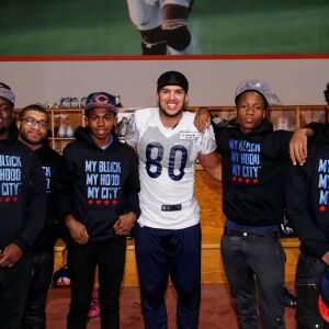Bears tight end Trey Burton poses with teens from My Block, My Hood, My City at Halas Hall. | Provided by Chicago Bears