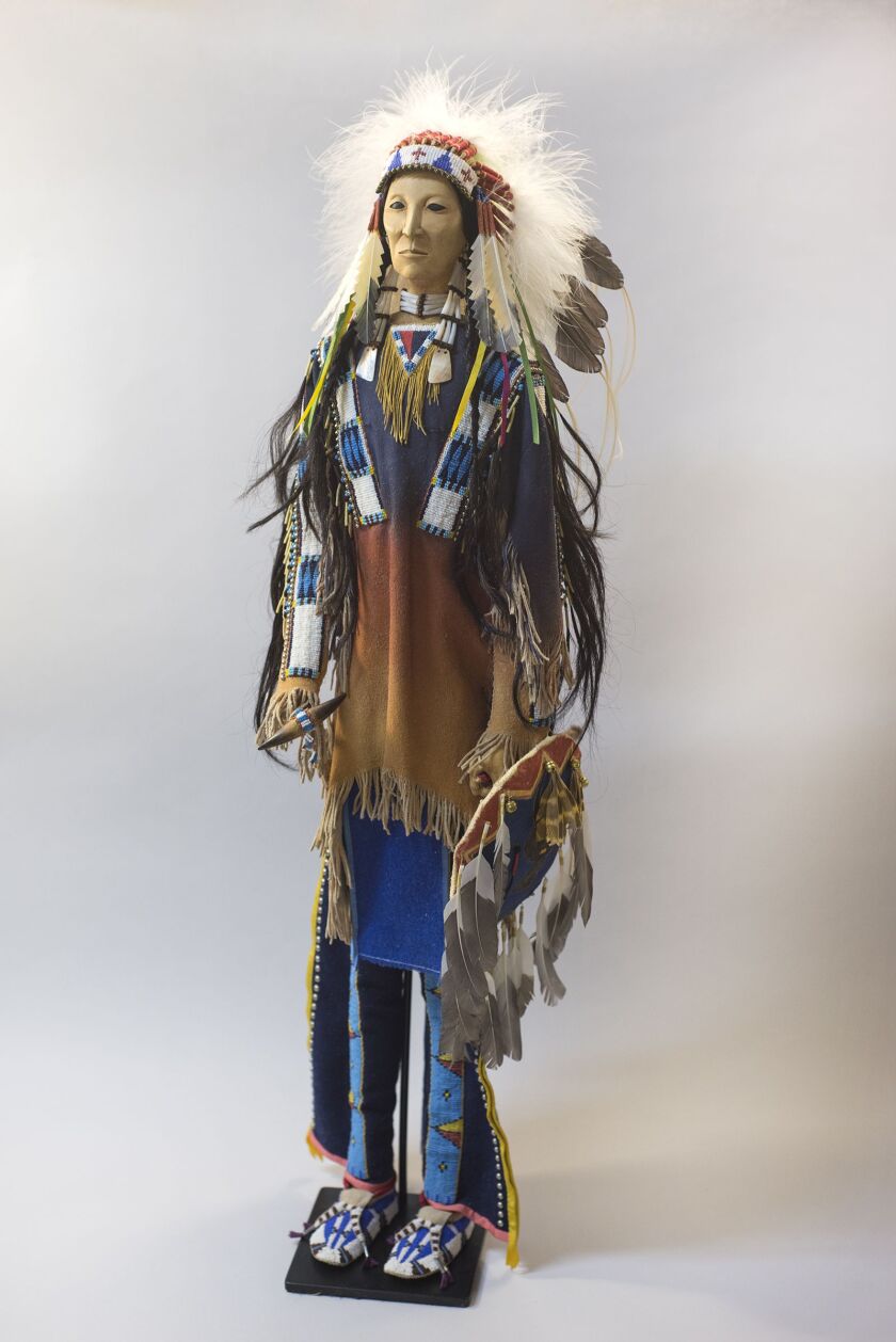 A doll by noted Lakota artist Rhonda Holy Bear is on display at the Mitchell Museum of the American Indian. | COURTESY OF THE MUSEUM