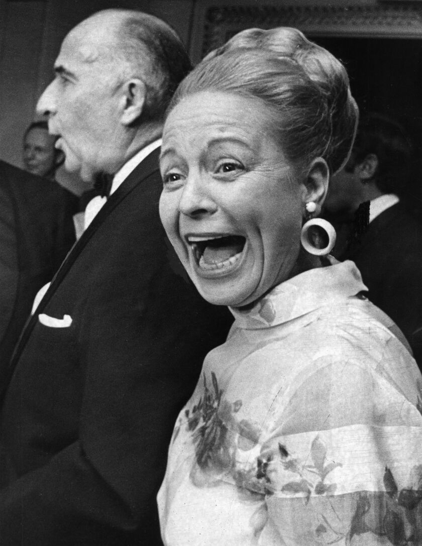 U.S. Attorney General John N. Mitchell and his wife, Martha, attend a 1970 political reception. | Sun-Times photo by Jack Lenahan