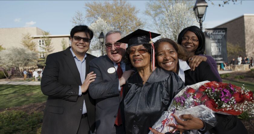 Barbara Cole (center) after receiving her diploma. | Provided photo
