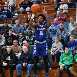 Bloom’s Keshawn Williams (11) fires a three in the corner, Saturday 12-29-18. Worsom Robinson/For Sun-Times