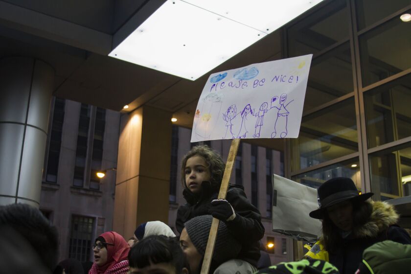Several groups gathered in the Loop Wednesday to protest against President Trump’s executive orders on immigration. | Maria Cardona/Sun-Times