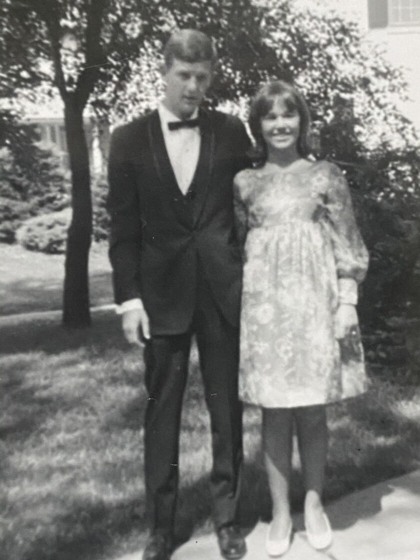 William Dabbert, shown here with date before his high school prom, attended Western Illinois University but left school a semester before graduation because he expected to be drafted and wanted to spend time with his hometown friends.