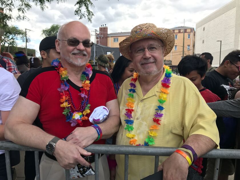 Larry Gehrke (left) with his husband Roger Bottorff at the Chicago Pride Parade. | Jacob Wittich/Sun-Times