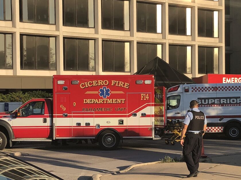 An ambulance sits outside Mount Sinai Hospital after a Cicero police officer was shot on Thursday afternoon. | Mitchell Armentrout/Sun-Times