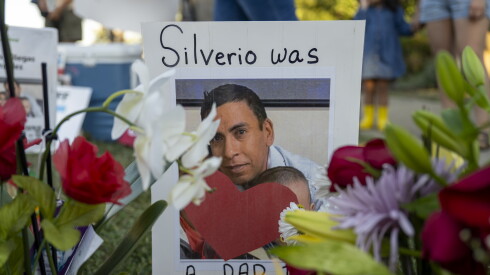 A photo of Silverio Villegas-Gonzalez sits at a memorial at West Grand Avenue and Emerson Street in suburban Franklin Park near the site where Villegas-Gonzalez was shot and killed by an Immigration and Customs Enforcement (ICE) officer during a traffic stop on Sept. 12.