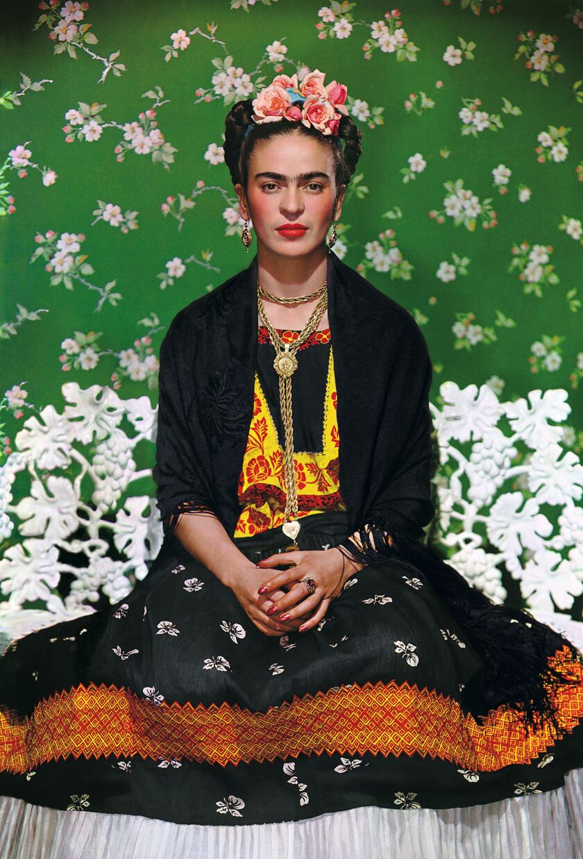 “Frida on White Bench,” photo by Nickolas Muray © Nickolas Muray Photo Archive