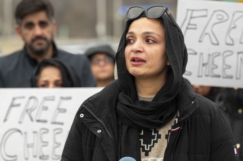 Hamna Amin, daughter of Asif Amin Cheema, sobs as she speaks to reporters during a press conference at the kiss and ride parking lot outside the Rosemont Blue Line station in suburban Rosement, Thursday, Jan. 1, 2026. Cheema a Humboldt Park restaurant owner is set to be deported after the 7th U.S. Circuit Court of Appeals ruled that his deportation order could proceed.