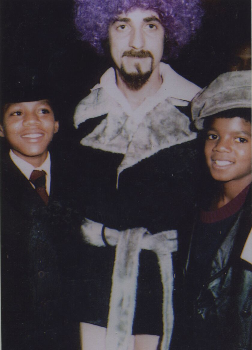 Perry Kanlan (center), known around South Side clubs as the “Dancin’ Man,” danced with members of the Jackson 5.