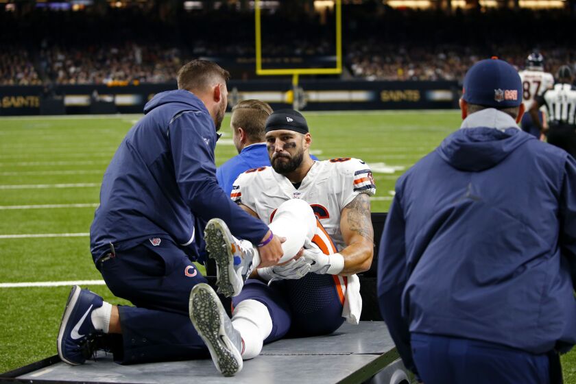 Chicago Bears tight end Zach Miller (86) taken off the field on a cart, after injuring his leg in the second half of an NFL football game against the New Orleans Saints in New Orleans, Sunday, Oct. 29, 2017. Miller hurt his leg on an apparent touchdown re