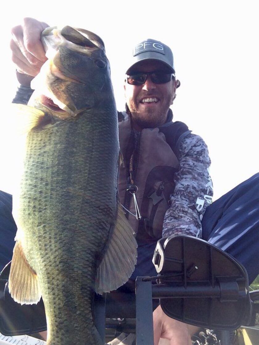 Dustin Murguia with a big largemouth from Mazonia State Fishing and Wildlife Area.<br>Credit: For the Sun-Times