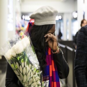 Celestine Mugisha and his wife, Winniefred Akello, embrace at O’Hare International Airport as they are reunited after living apart for more than three years, Jan. 22, 2020. Mugisha and Akello were married in Uganda in September 2016 and, days later, Mugisha moved to Chicago as part of the United States’ refugee resettlement program. More than three years later, Akello was also resettled through the program.