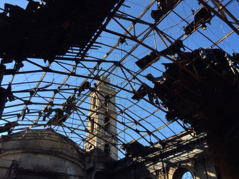 <small><strong> A fire Oct. 7 destroyed part of the Shrine to Christ the King in the Woodlawn neighborhood. | Sam Charles/For the Sun-Times</strong></small>