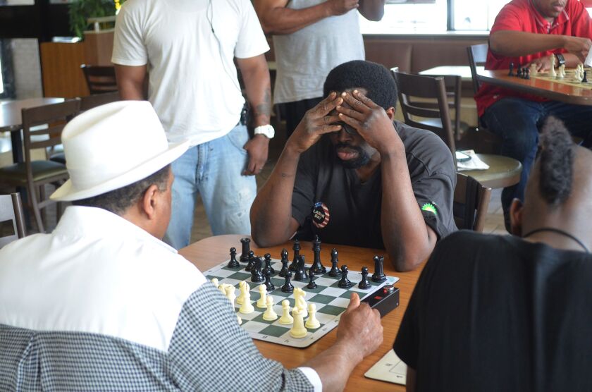 <small><strong>A group of men who gather at a Washington Heights McDonald’s play “Blitz” — a fast-paced version of chess that many players find intimidating. | Mitch Dudek/Sun-Times</strong></small>
