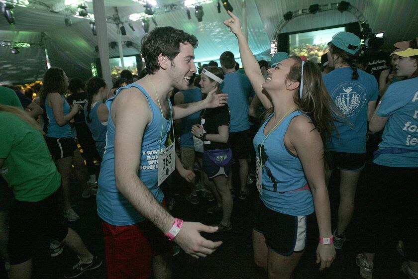 Northwestern students Avy Faingezicht (left) and Erin Anderson at the 2013 Northwestern University Dance Marathon.