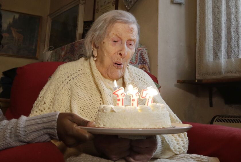 Emma Morano of Italy is shown celebrating her 117th birthday last year. Dr. Carlo Bava told The Associated Press by telephone that Morano’s caretaker called him to say the woman had passed away Saturday afternoon while sitting in an armchair in her home.