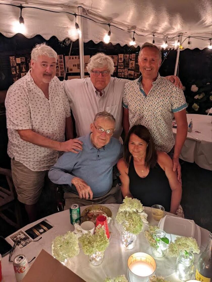 Harold Kulat (in blue shirt) and his family on his 100th birthday.