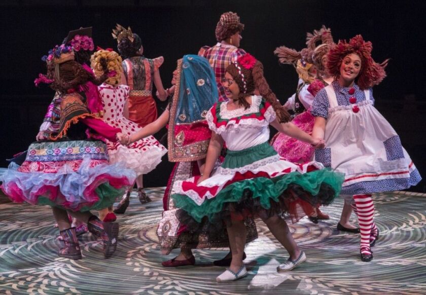 The global dolls act out in the Albany Park Theater Project production of “Feast,” at the Goodman Theatre. (Photo: Liz Lauren)