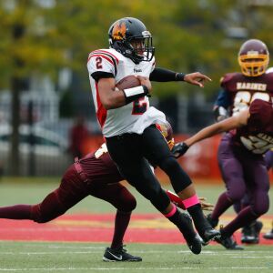 Phoenix’s Jamon Gooden (2) runs the ball against Marine.