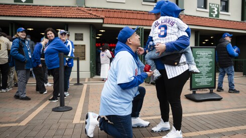 Christopher Escobedo proposes to Christina Ayala at Wrigley Field at the Cubs home opener on April 4.