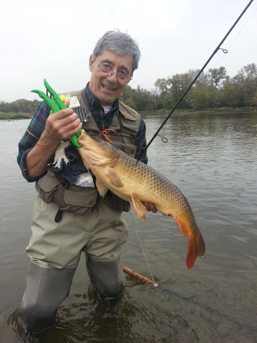 Ed Buric with a carp from the Des Plaines River. Provided photo