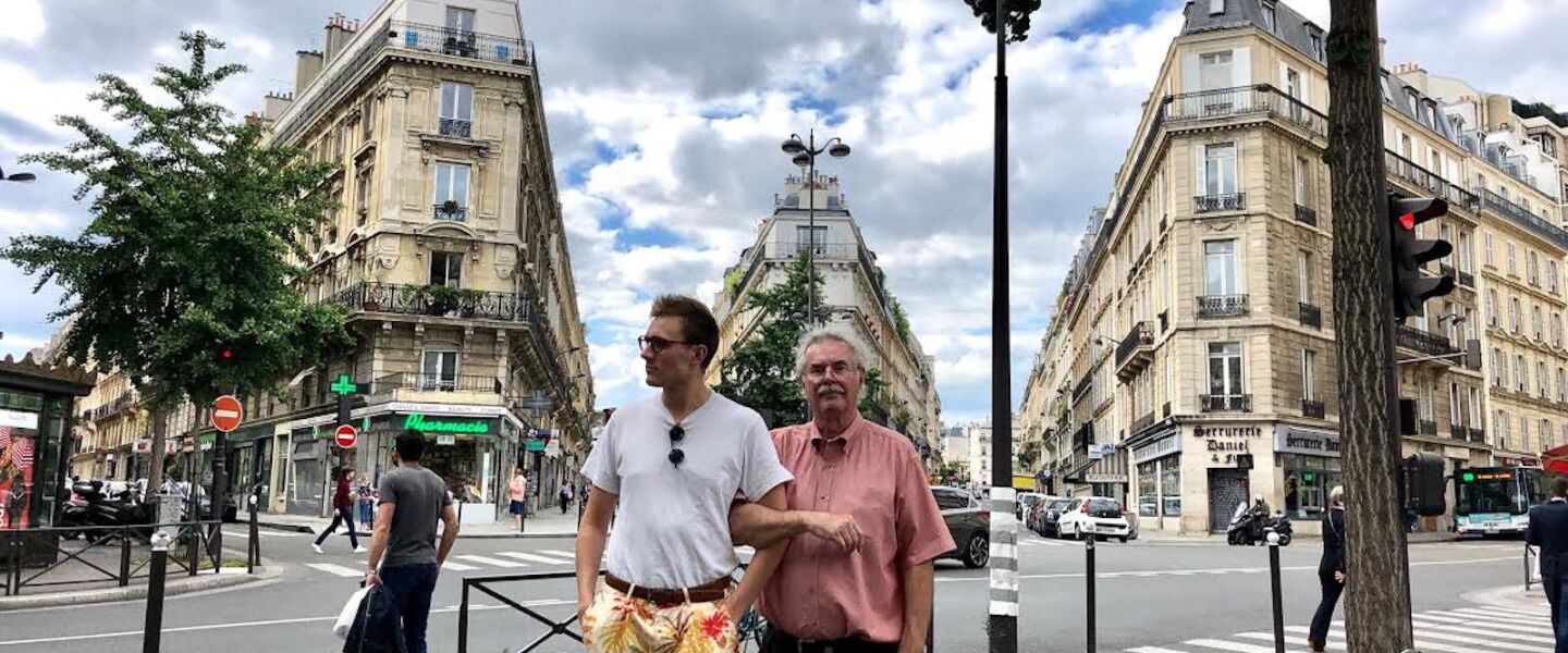 Frank Zuccari (right) and Alex King mimic the Caillebotte painting “Paris Street; Rainy Day.”