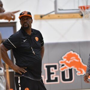 Leo coach Shawn Frison watches his team practice. Worsom Robinson/For the Sun-Times.