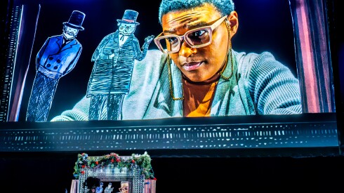 LaKecia Harris in Manual Cinema's Christmas Carol at the Studebaker Theater