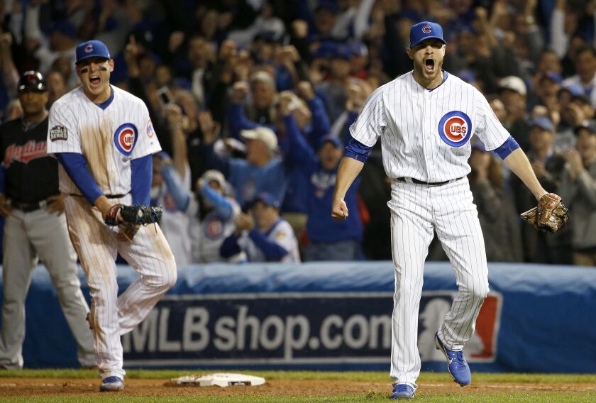 <em>Anthony Rizzo, left, and pitcher Justin Grimm react after a double play during the fifth inning. (AP Photo/Nam Y. Huh)</em>