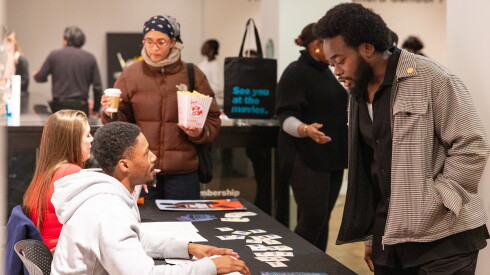 Tayo Jaiye (right) attends a screening of "My Father’s Shadow," hosted by the Black Film Club Collective at Gene Siskel Film Center in the Loop on Thursday, Feb. 12, 2026.